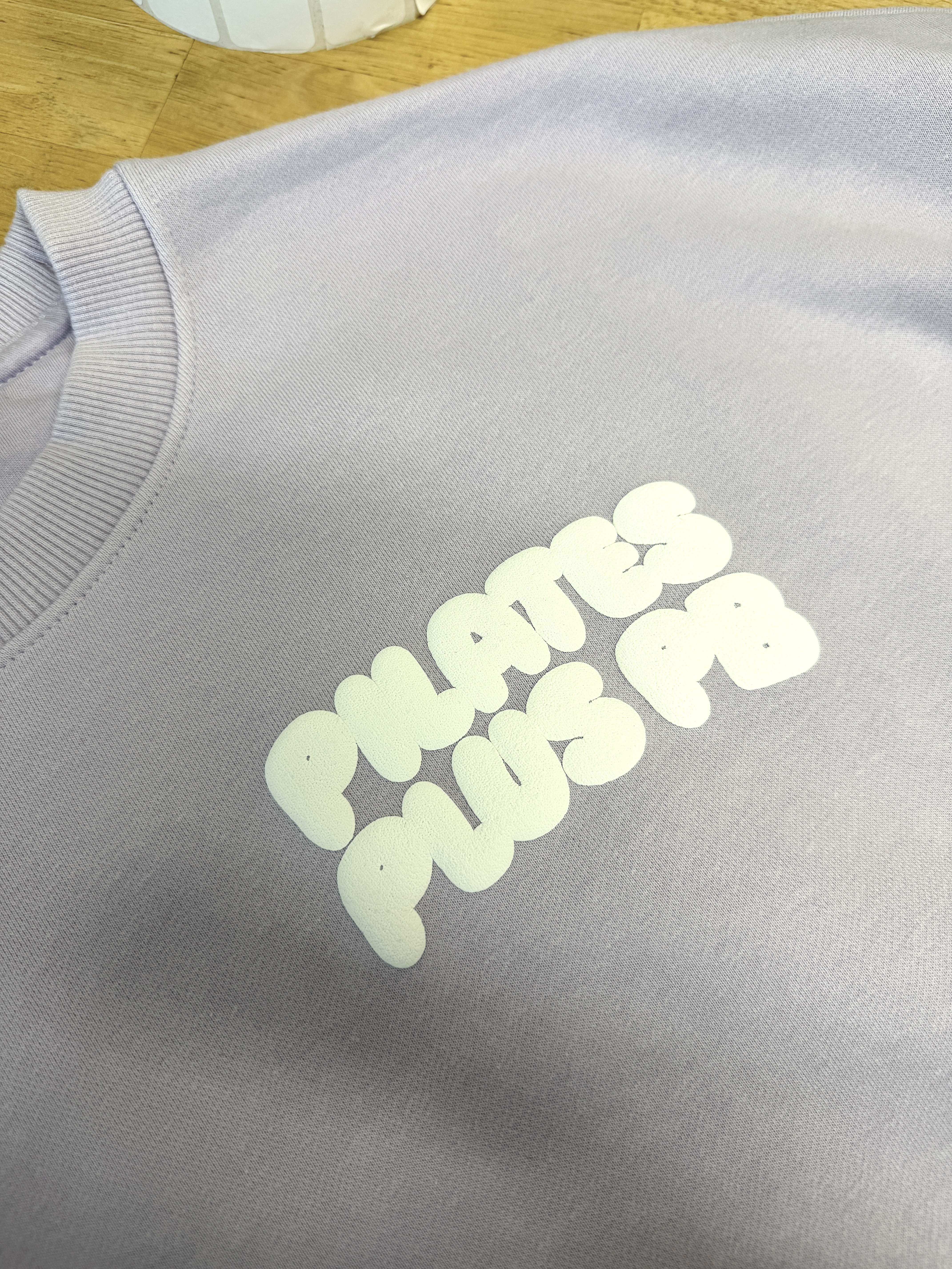 Puff print — heavyweight crop lavender with white Pilates Plus puff print
